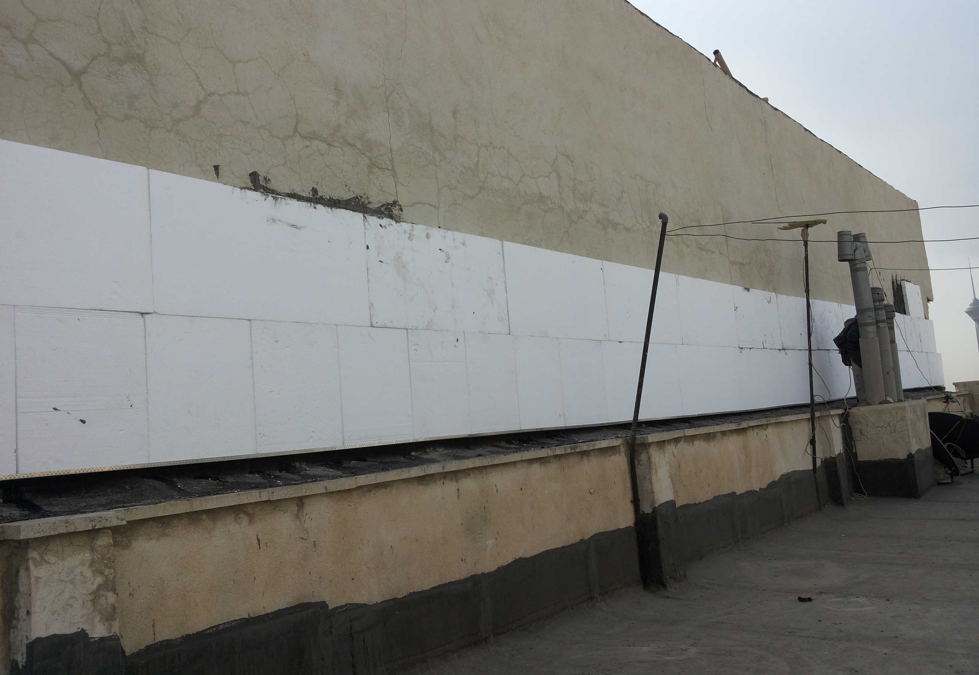 عایق حرارتی نمای اتیکس در دیوار جانبی 